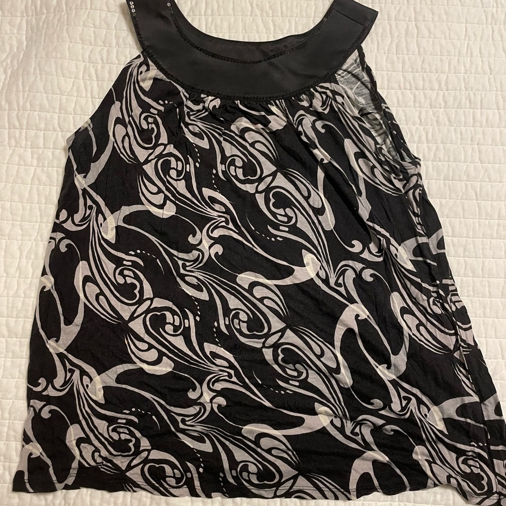 Express sleeveless top. Sequined neck, black, white & grey swirls. Gently worn.